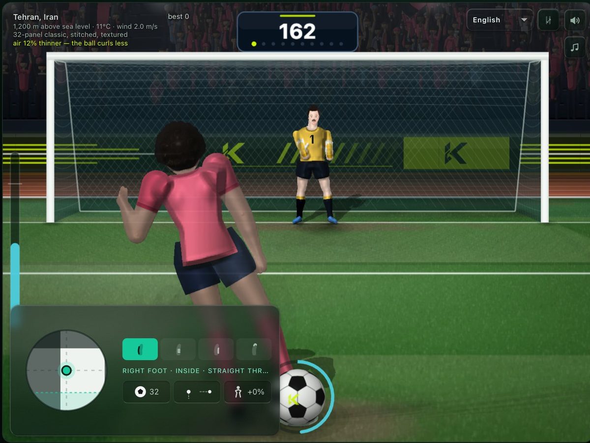 Il tiratore prende la rincorsa verso il pallone in Spot Kick mentre il portiere si prepara